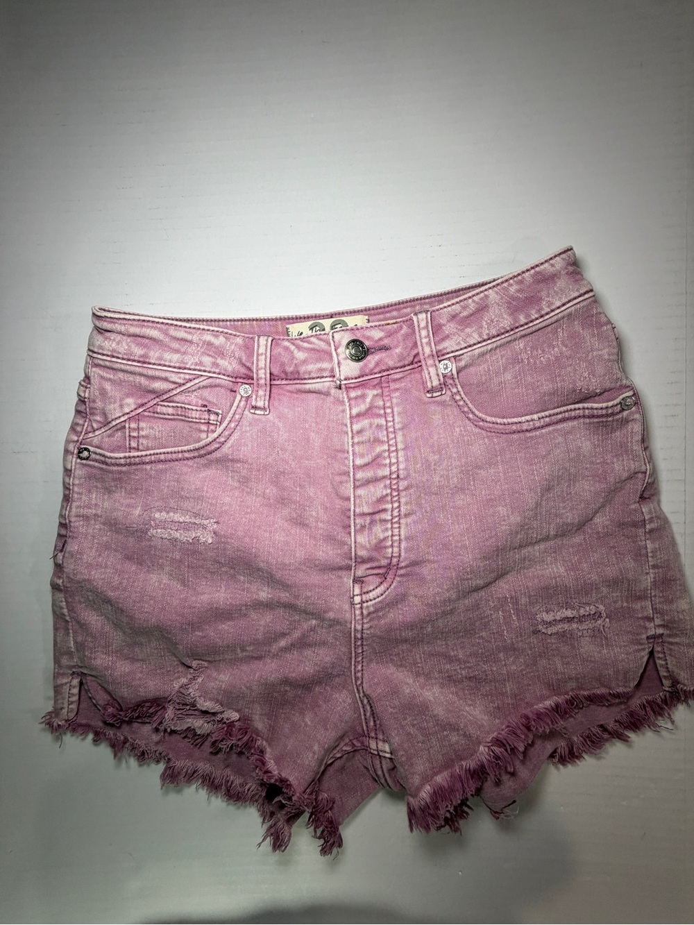 We The Free button fly Washed Pink High-Rise Distressed Denim Shorts